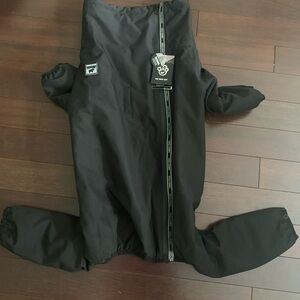 Canada pooch snow suit size 24. New with tags.